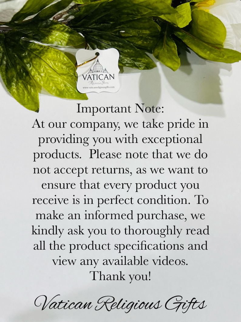 May include: A white tag with the word "VATICAN" and a logo of a building is attached to a gold string. The tag is surrounded by green leaves and text that reads "Important Note:" and "Vatican Religious Gifts."