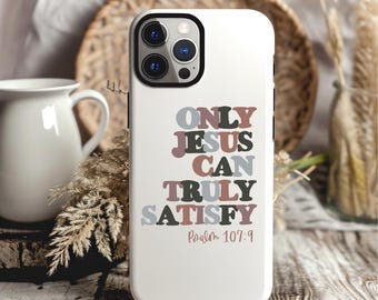 May include: White phone case with a colorful design that says "Only Jesus Can Truly Satisfy" with the scripture reference "Psalm 107:9" underneath.
