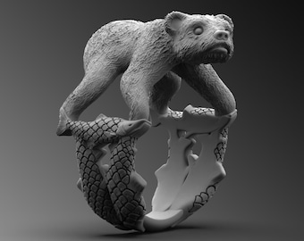 May include: A silver ring with a bear standing on top of a sculpted fish design.
