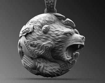 May include: Silver pendant necklace featuring a detailed bear head design. The bear's mouth is open and its teeth are visible. The pendant is round and has a textured surface.
