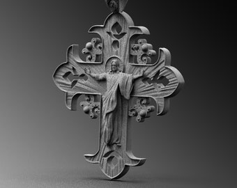 May include: A silver pendant necklace featuring a detailed cross with a figure of Jesus Christ in the centre. The cross has intricate designs and a textured surface.