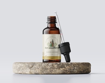 May include: A brown glass bottle with a dropper, labelled "ArcanaHerb" and "Clove & Myrrh 1:3 Herbal Supplement 100ml". The bottle is sitting on a round, grey stone.