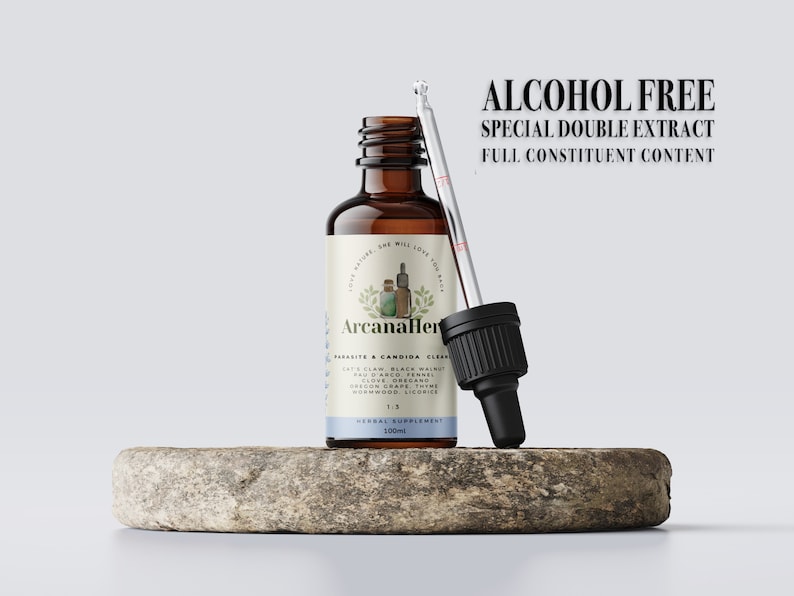 May include: A brown glass bottle with a dropper, labeled "ArcanaHerb" and "Parasite & Candida Cleanse". The bottle is on a round, gray stone surface. The text "Alcohol Free Special Double Extract Full Constituent Content" is written in black text on a white background.