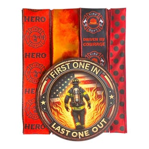 May include: A round metal sign with a firefighter graphic, surrounded by red and black ribbons. The sign reads "FIRST ONE IN, LAST ONE OUT" and features a firefighter in front of a burning building. The ribbons have text like "HERO" and "FIRE DEPT."