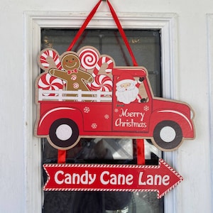 Candy Cane Lane Santa Claus Gingerbread Man Red Truck Christmas Sign Door Hanger, Peppermint lollipops & candies Holiday Home Decor