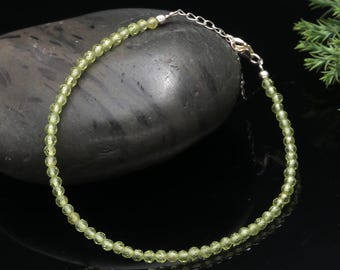 Perle Péridot ronde facettée 4mm