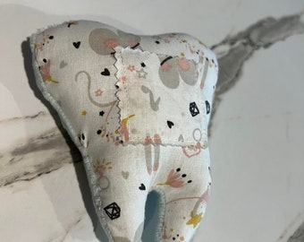 Dent pour petite souris