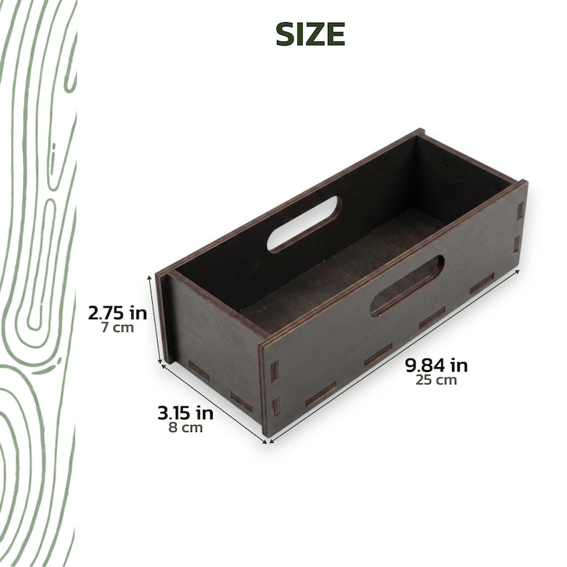 May include: A dark brown wooden storage box with cut-out handles. The box is 9.84 inches (25 cm) long, 3.15 inches (8 cm) wide, and 2.75 inches (7 cm) high. The word "SIZE" is printed in green at the top.