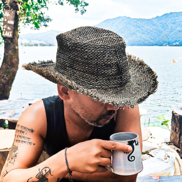 Hemp straw hat with frayed edge for man, flexible but resistant, foldable handmade hat for summer.