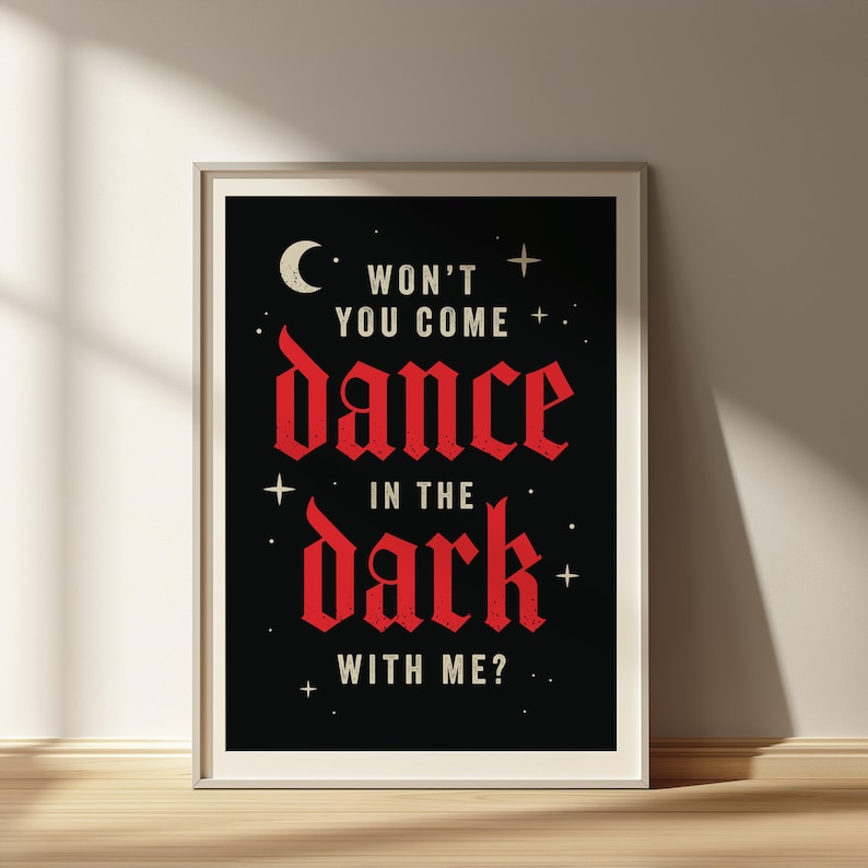 May include: A black and white poster with a red gothic font that reads "Won't you come dance in the dark with me?" The poster features a crescent moon and stars.