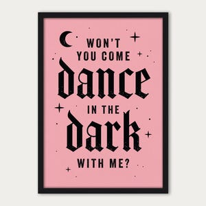 May include: Pink framed print with black text that reads "Won't you come dance in the dark with me?" with a crescent moon and stars.