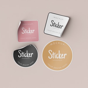 May include: Four sticker mockups with the text "MOCKUP. Sticker YOUR DESIGN HERE." in white text on a black, pink, gold, and white background.