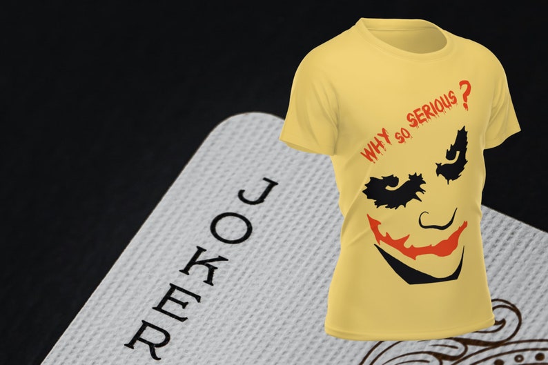 May include: A yellow t-shirt with a black and red graphic of the Joker from the Batman comics. The graphic includes the Joker's face and the text "WHY SO SERIOUS?"