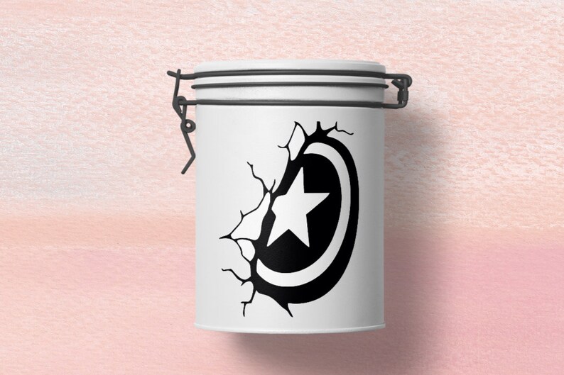May include: A white ceramic jar with a black and white graphic of a star inside a circle, appearing to break through a cracked wall. The jar has a metal lid with a latch.