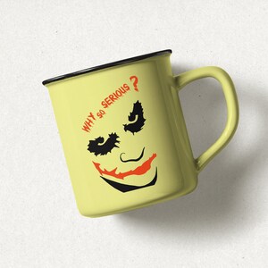 May include: A yellow ceramic mug with a black rim and handle. The mug features a black and white illustration of the Joker from Batman with the text "WHY SO SERIOUS?" in red.