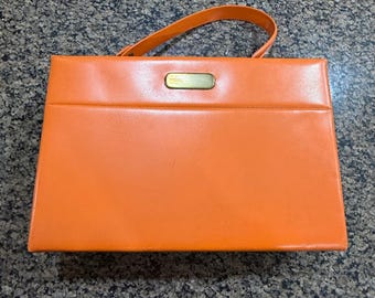 Sac à main structuré orange vintage des années 1960 avec poignée sur le dessus, pochette mod rétro