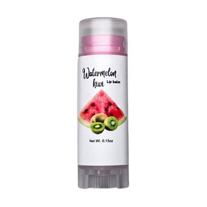 May include: A pink lip balm tube with a white label that says "Watermelon Kiwi Lip Balm". The label also features a slice of watermelon and two kiwi fruits. The tube is 0.15 oz.