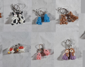 earrings with characters modeled in cold porcelain