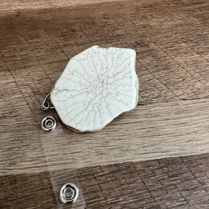 White Buffalo Stone Badge Reel