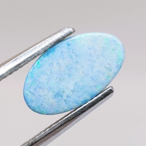 Natural doublet Opal on iron stone from Australia