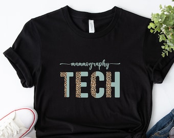 May include: Black t-shirt with the text "mammography TECH" in white with a leopard print and light blue background.