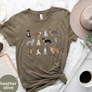 Pode incluir: Uma camiseta de cor oliva heather com um design de v&aacute;rios border collies em v&aacute;rias cores e poses.