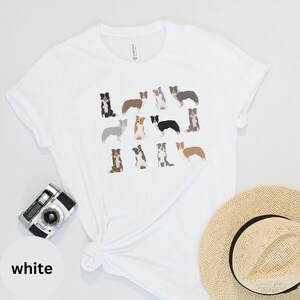 Pode incluir: Camiseta branca com uma estampa gr&aacute;fica de v&aacute;rios border collies em diferentes cores e poses.