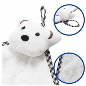 May include: A white plush bear-shaped baby washcloth with black spots for eyes and a nose, and brown embroidered details. It has a black and white checkered loop for hanging. The image includes a close-up of the washcloth's texture and loop.