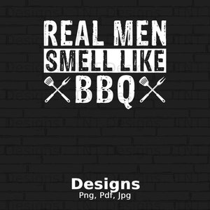 May include: White text on a black brick background reads "Real Men Smell Like BBQ" with a crossed spatula and fork graphic.