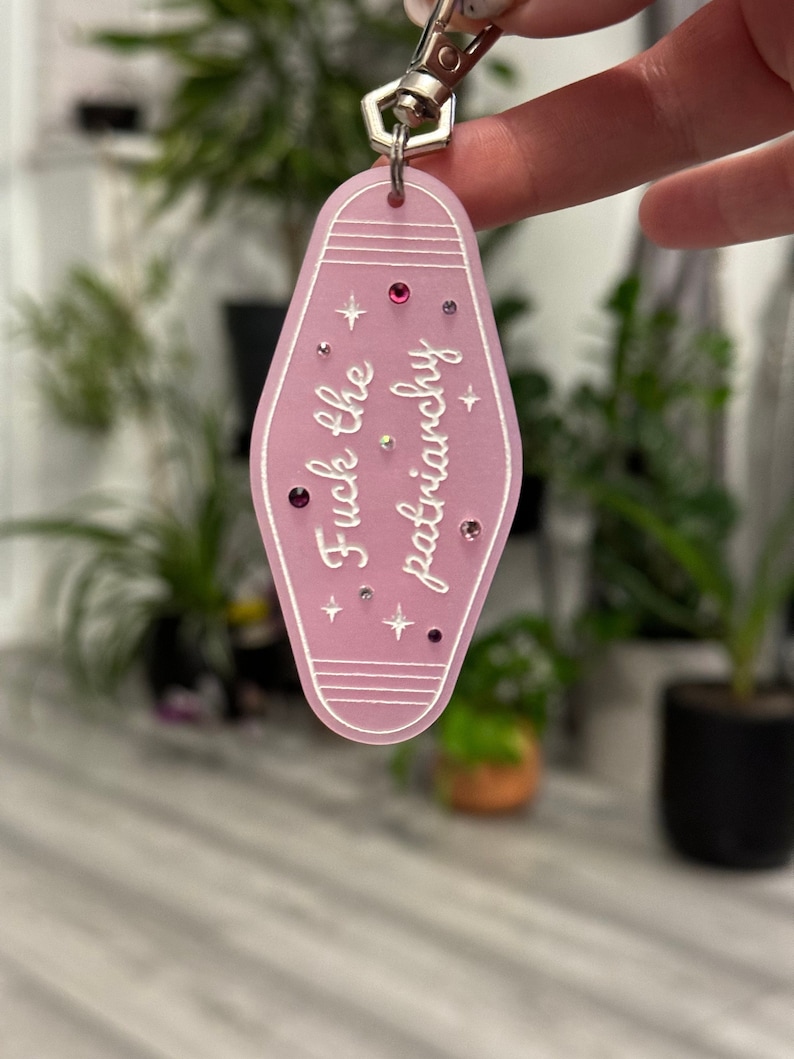 Fuck the patriarchy motel keychain/keyring. Christmas eras gift/stocking filler image 1