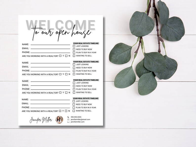 May include: A white open house sign-in sheet with the words "WELCOME to our open house" in gray and black. The form includes fields for name, email, and phone, with checkboxes for real estate timeline options. A sprig of green leaves is in the background.