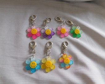 Daisy Smiley Face Clip on Charm. Ideal for bag, purse, back pack and more!!