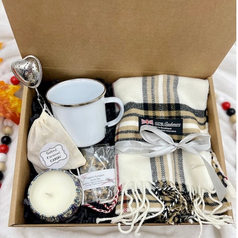 Cozy winter Christmas gift basket with hygge essentials for women