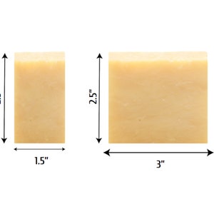 May include: Two bars of natural soap, one is 1.5 inches wide and 2.5 inches tall, the other is 3 inches wide and 2.5 inches tall.