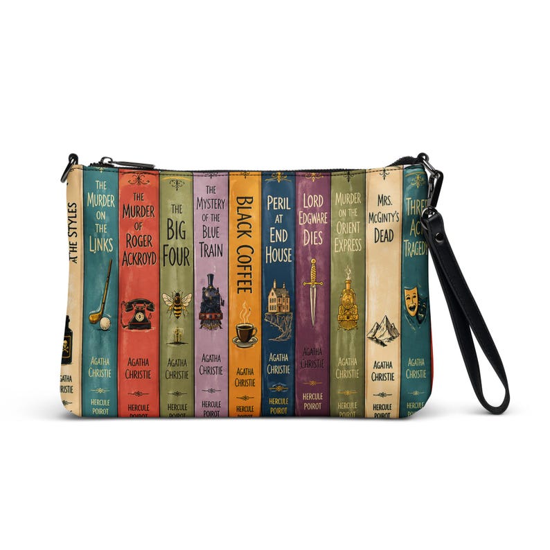 May include: A rectangular zipped wristlet featuring a graphic print of multiple Agatha Christie book spines in various colours including red, blue, yellow, and green. Each spine displays a unique title, author name, and a small thematic illustration.