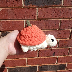 May include: A rustic wooden sign with the text "Welcome to our home" in white lettering. The sign features a distressed finish and a simple, inviting design, perfect for entryway decor.