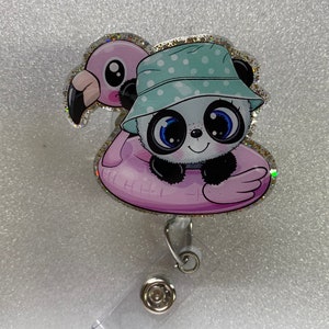 May include: A glittery badge reel featuring a panda wearing a blue and white polka dot hat and riding a pink flamingo float.