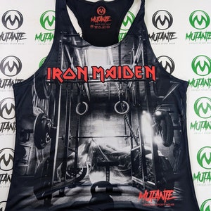 May include: Black tank top with a graphic print of a weightlifting gym scene. The text "IRON MAIDEN" is printed in red on the front of the tank top. The text "MUTANTE UNIQUE SPORT WEAR" is printed on the bottom of the tank top.