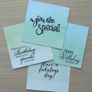 May include: Four square greeting cards with a light blue and green gradient background. The cards feature black script text that reads: you are special, Wishing you a Birthday that's just as special as you are, Happy Birthday to you, and Have a fabulous day!