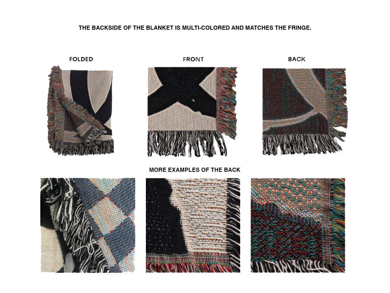 May include: A folded woven blanket with a black and white pattern on the front and a multi-colored pattern on the back. The back of the blanket has a fringe.