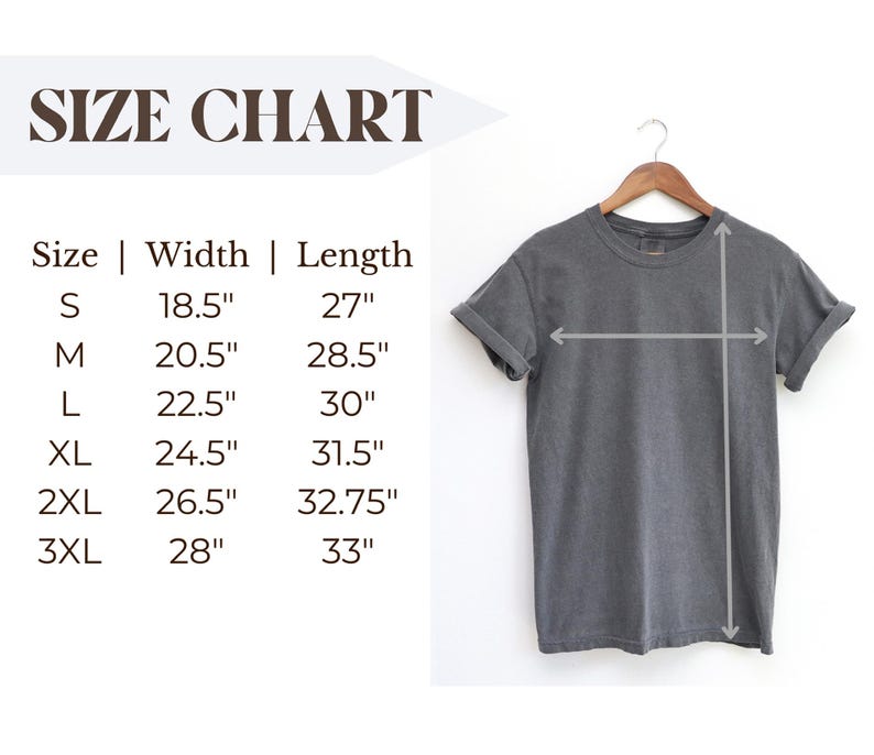 May include: A gray t-shirt hanging on a wooden hanger, with a size chart displayed to the left. The size chart shows measurements in inches for sizes S through 3XL, including width and length.