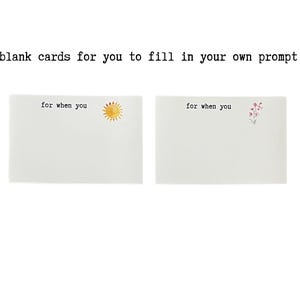 May include: Two blank cards with the text "for when you" printed on each. One card has a yellow sun illustration and the other has a pink flower illustration.