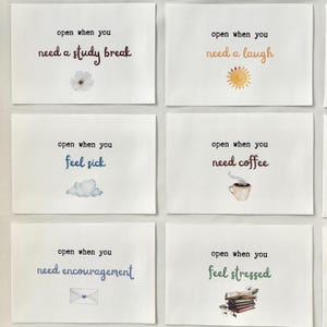 May include: Six white cards with colorful illustrations and text. The text on the cards reads: "open when you need a study break", "open when you need a laugh", "open when you feel sick", "open when you need coffee", "open when you need encouragement", and "open when you feel stressed".
