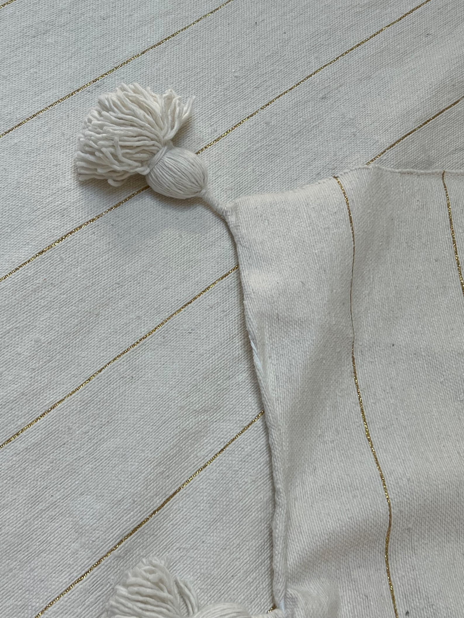Handmade Moroccan Cotton Throw with Pom-Pom Detail — view 6