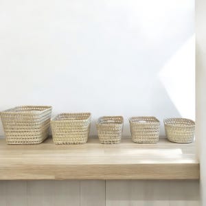 Medium range storage baskets woven from palm leaves, storage baskets, wicker baskets
