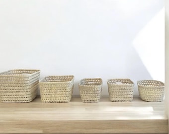 Woven palm leaf storage baskets