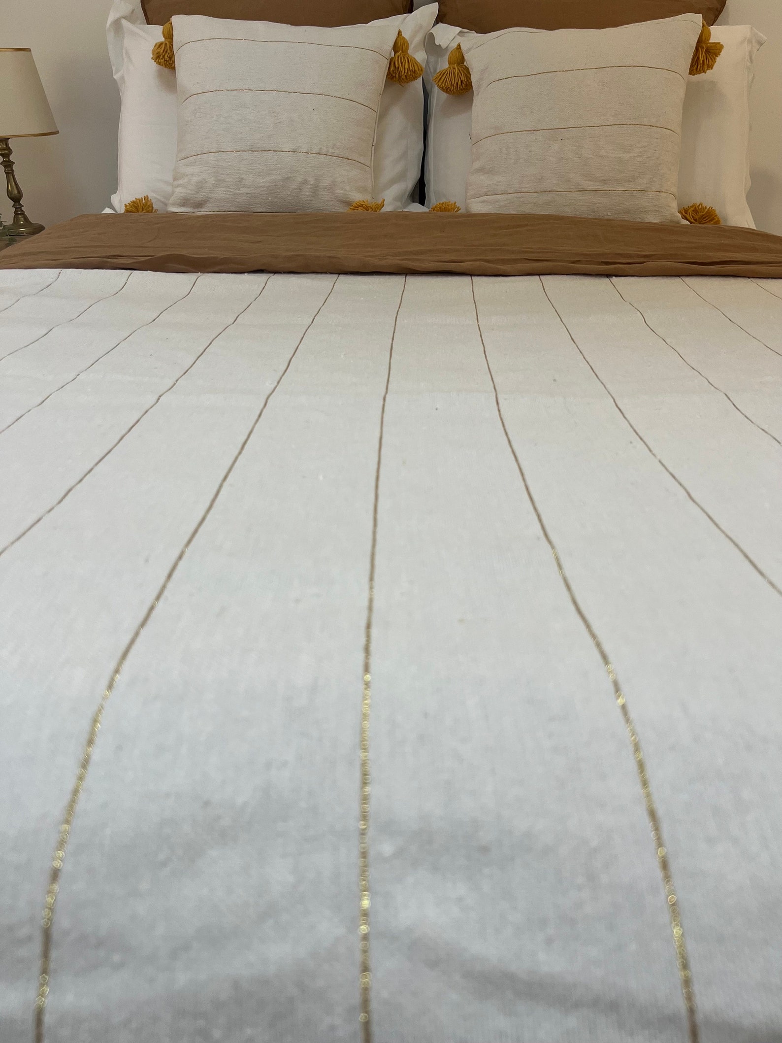 Handmade Moroccan Cotton Throw with Pom-Pom Detail — view 9