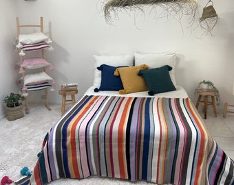 Moroccan multi-colored pompom blanket