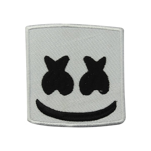 May include: White iron-on patch with a black smiling face with two black eyes. The face is a popular music icon.