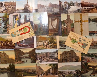May include: A collection of vintage postcards featuring various scenes. The postcards depict landscapes, buildings, and illustrations, with some featuring text and imagery of a magnet and a globe. The color palette includes warm tones.